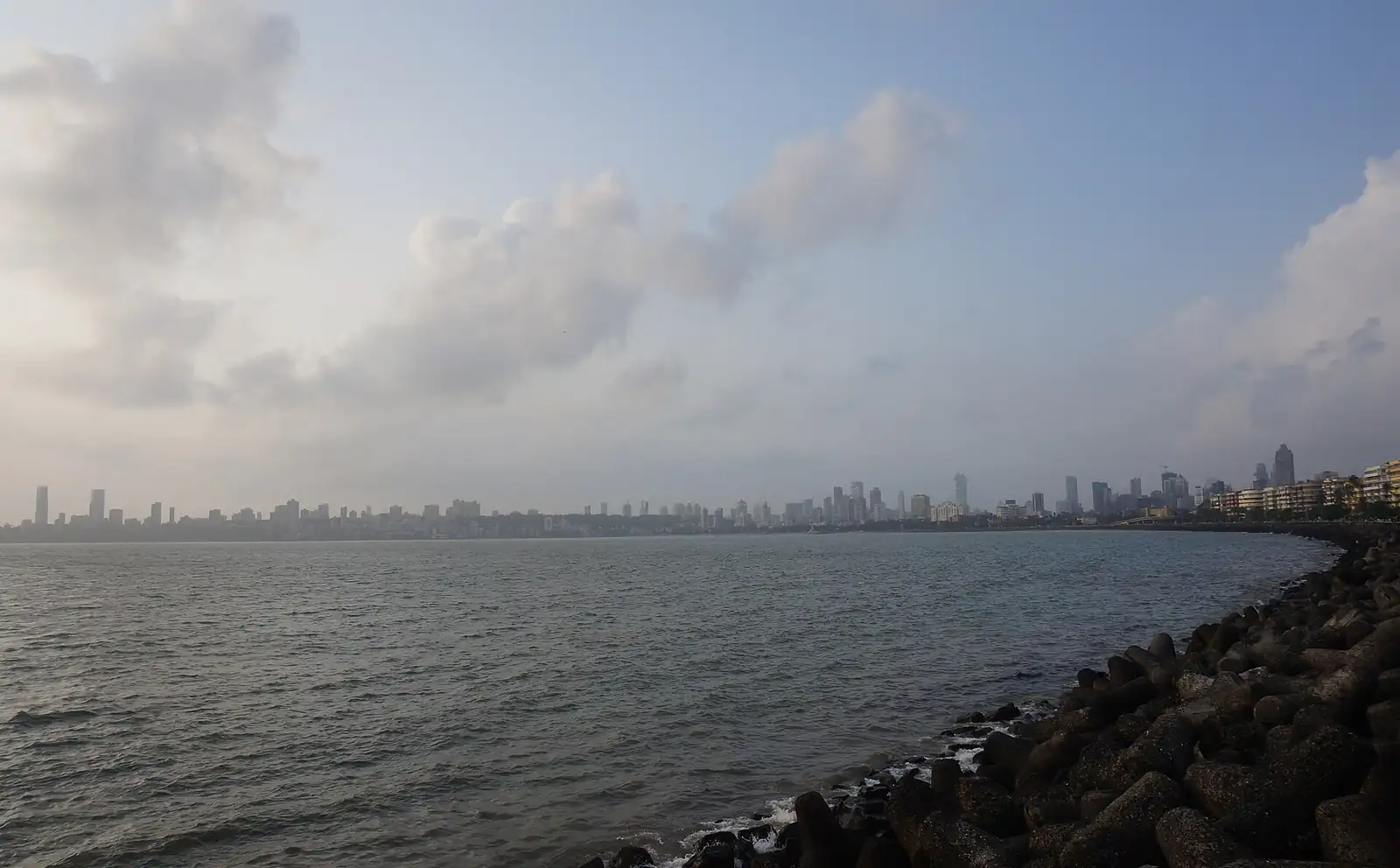 The Mumbai skyline across the bay from Marine Drive